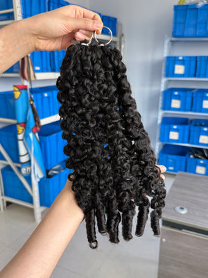 Close-up of knotless pre-separated crochet hair extensions pixie curly – natural look, quick install, tangle-free