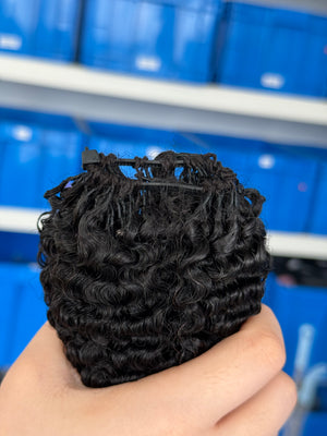 Close-up of knotless pre-separated crochet hair extensions exotic kinky curly – natural look, quick install, tangle-free