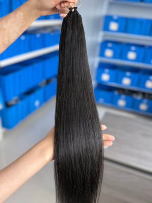 Close-up of knotless pre-separated crochet hair extensions straight – natural look, quick install, tangle-free